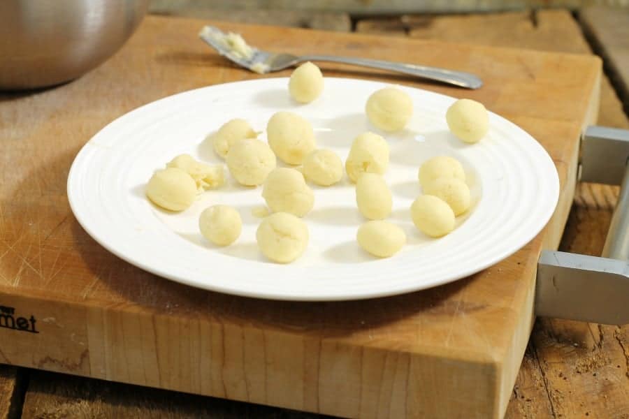 little balls of beurre manie on a white plate