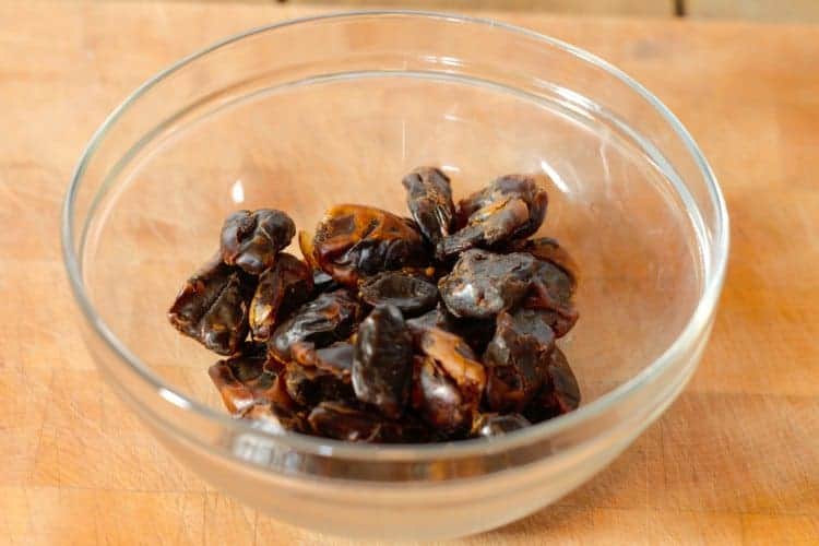 dried dates in a glass bowl