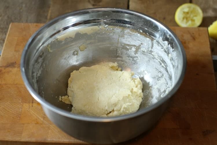 finished shortbread dough in a metal bowl