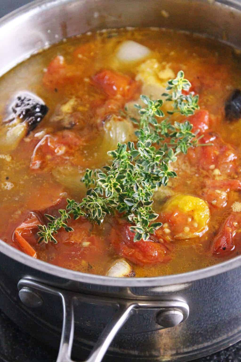 Oven Roasted Tomatoe Soup Simmering on the stove