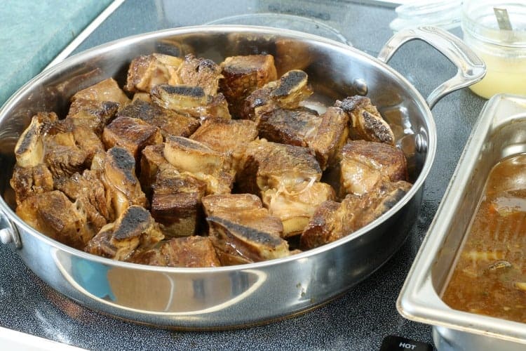 braised short ribs removed from the braising pan 
