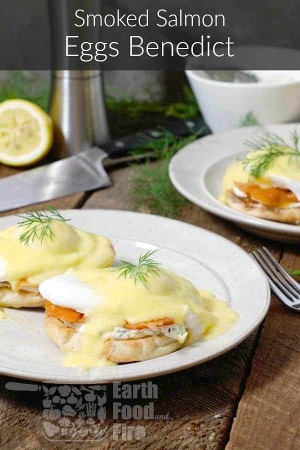 smoked salmon eggs benedict garnishe with dill on a rustic breakfast setting