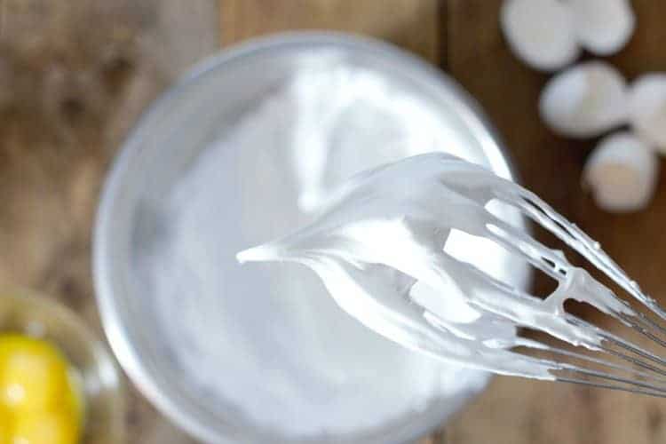 Egg whites whipped to 'stiff peaks' in a bowl