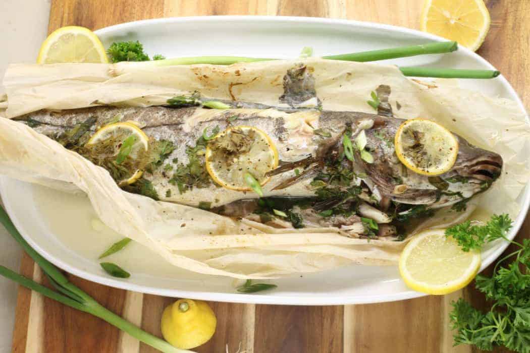 Whole Baked Haddock in parchment paper is an easy set and forget it supper !